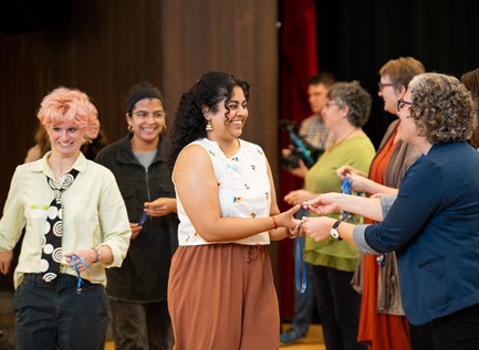 New students are welcomed by department chairs at Dornsife pinning ceremony